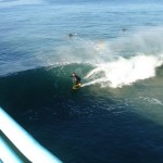 Surfing next to Pier